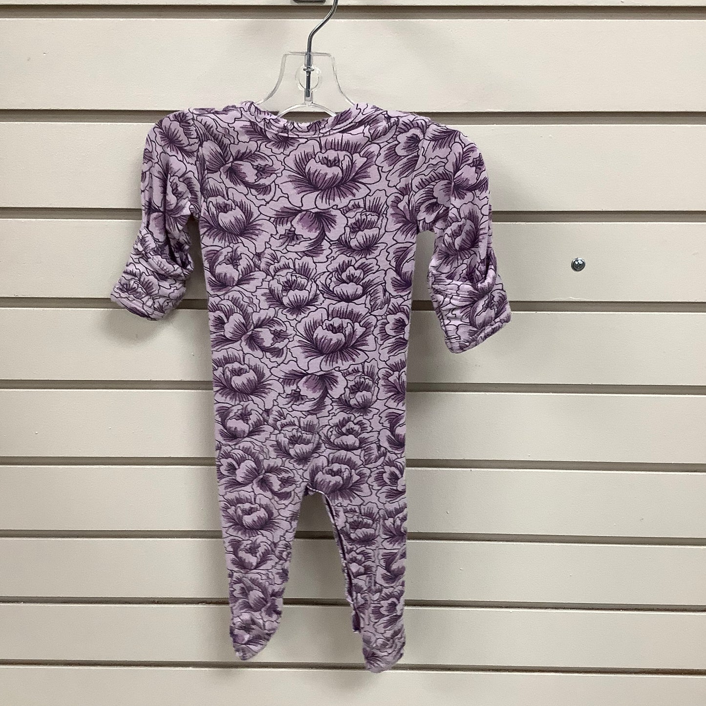 Kate Quinn purple newborn onesie